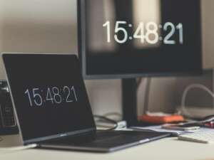 black laptop computer showing 15:48:21